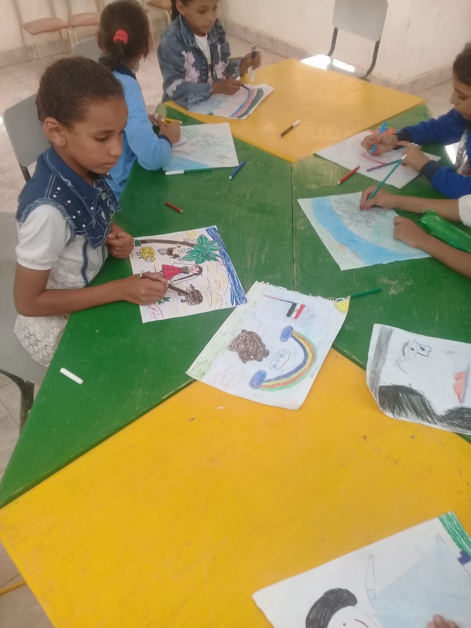 وفاء النيل .. ورشة رسم وتلوين مكتبة الطفل والشباب في قرية بغداد