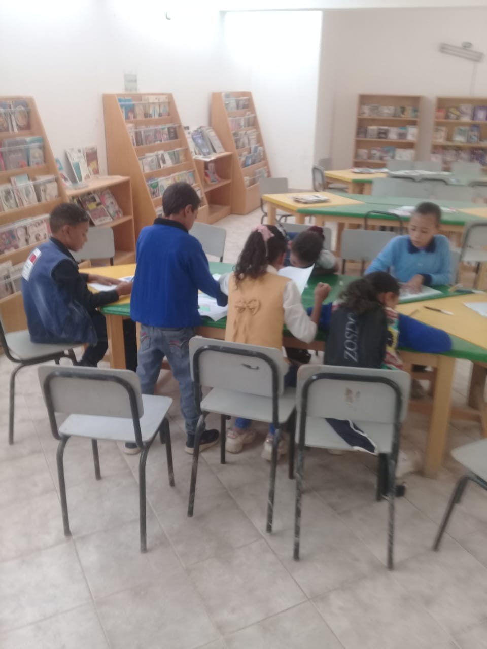 وفاء النيل .. ورشة رسم وتلوين مكتبة الطفل والشباب في قرية بغداد