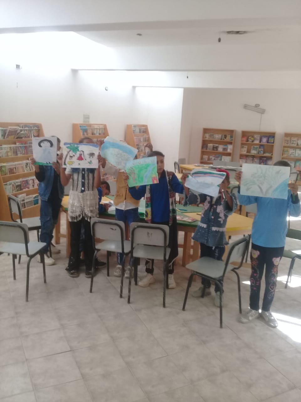 وفاء النيل .. ورشة رسم وتلوين مكتبة الطفل والشباب في قرية بغداد