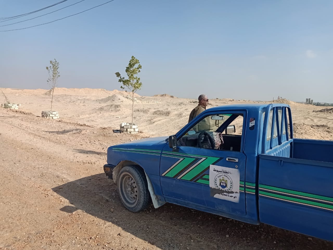 محلية ديروط: متابعة ري المسطح الأخضر بالمحطة الوسيطة للمخلفات الصلبة