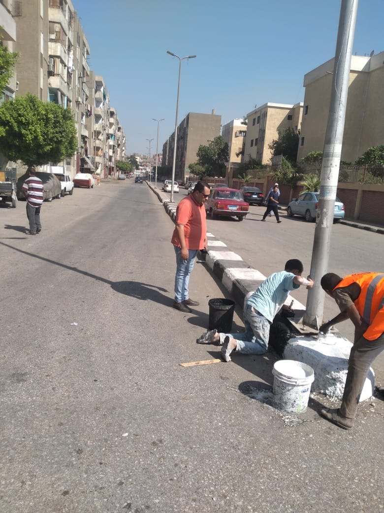 حملة لرفع وتنظيف المخلفات والأتربة في حي غرب اسيوط