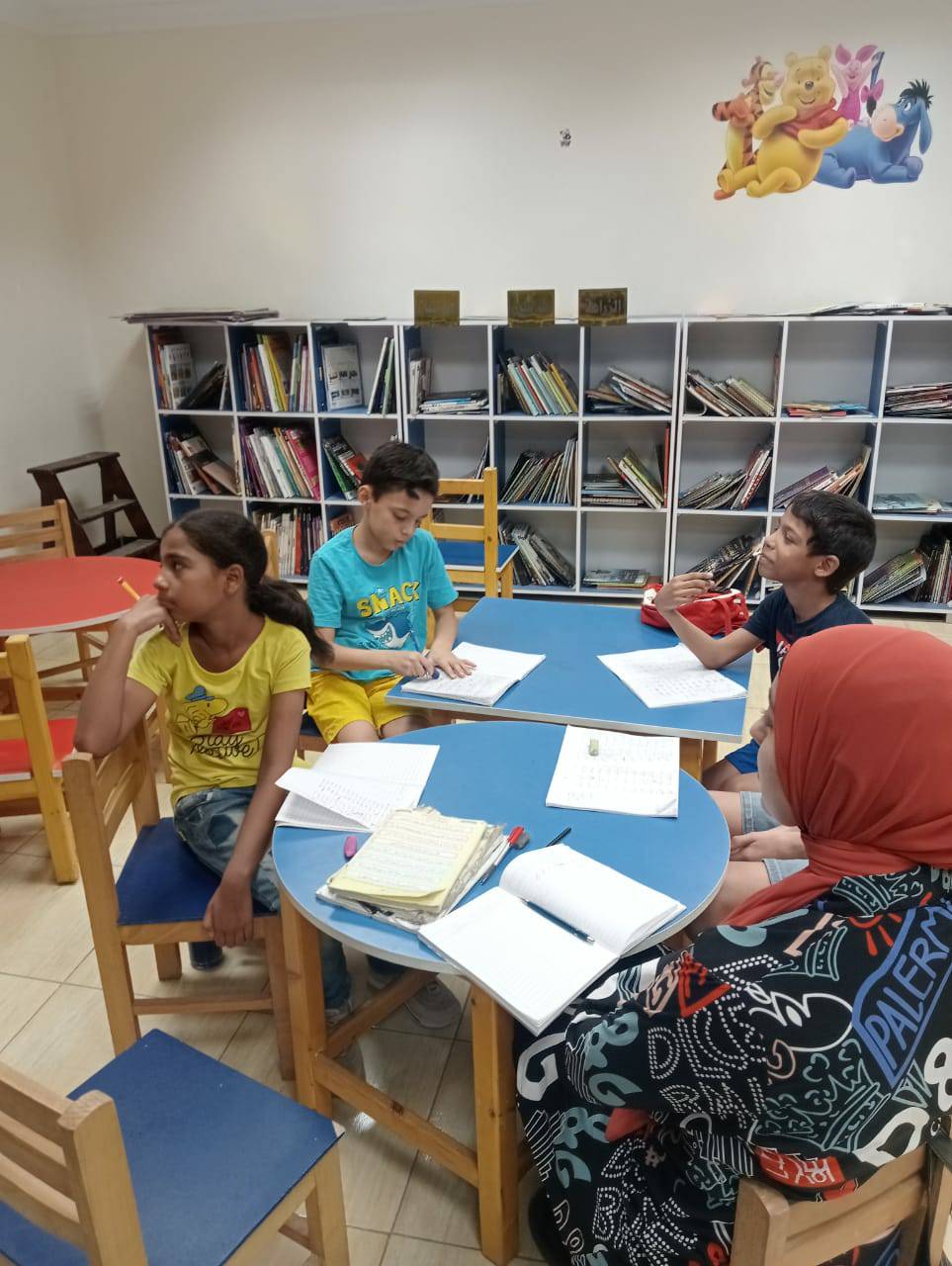 تعليم الخط العربي للاطفال في مكتبة مصر العامة اسيوط