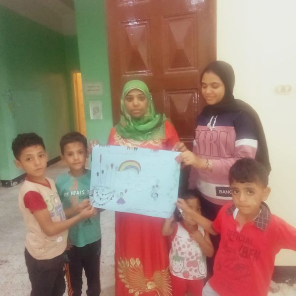 جانب من مرسم عن الاحتفال باعياد الطفولة