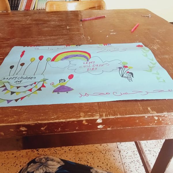 جانب من مرسم عن الاحتفال باعياد الطفولة
