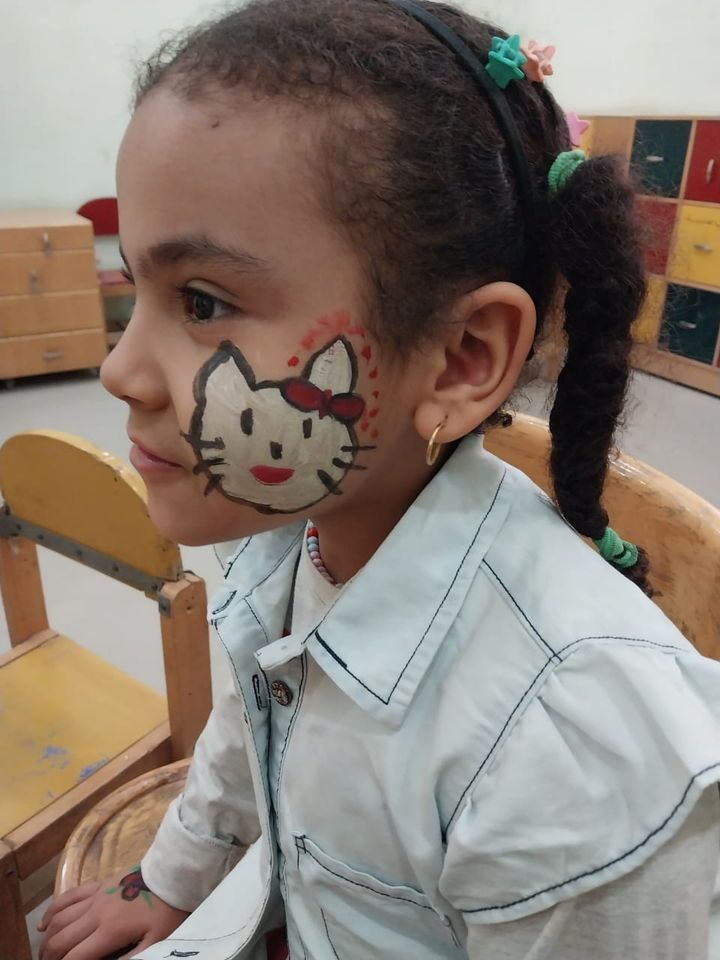 جانب من ورش رسم علي الوجوه للأطفال