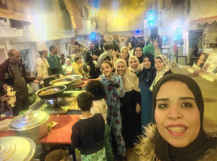 أهالي عزبة حمادة وتحضيرات إفطار 15 رمضان