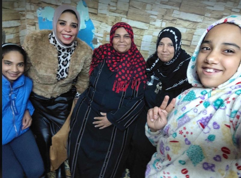 أهالي عزبة حمادة وتحضيرات إفطار 15 رمضان