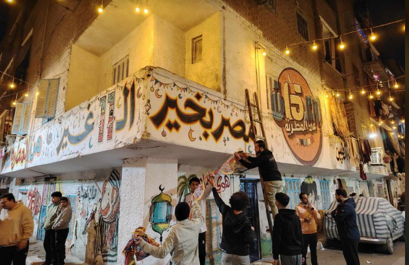 أهالي عزبة حمادة وتحضيرات إفطار 15 رمضان