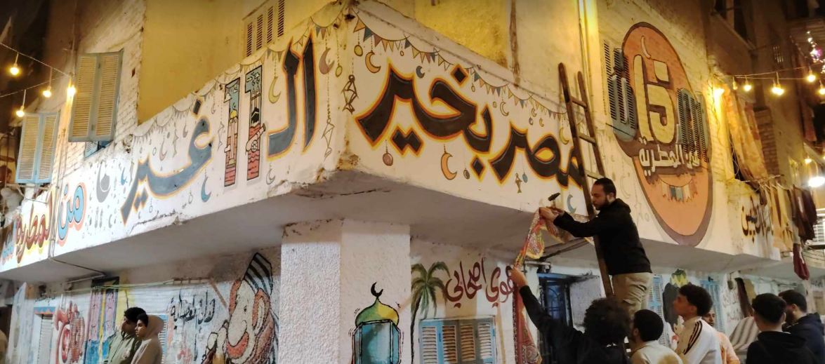 أهالي عزبة حمادة وتحضيرات إفطار 15 رمضان