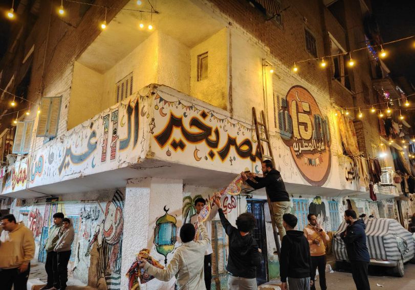 أهالي عزبة حمادة وتحضيرات إفطار 15 رمضان