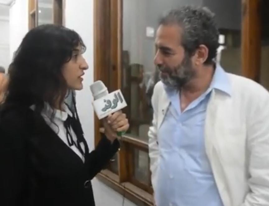 صورة أرشيفية - للفنان أحمد عبدالعزيز مع محررة الوفد 