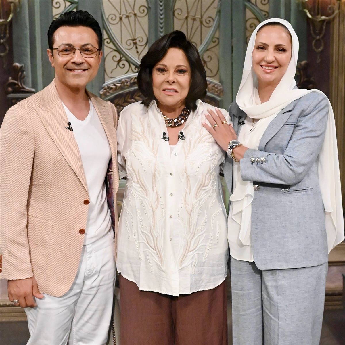 محمد سعيد محفوظ وزوجته مع إسعاد يونس