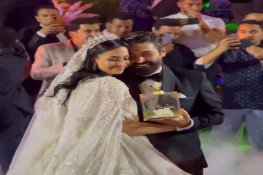 حميد الشاعري وابنته من حفل زفافها