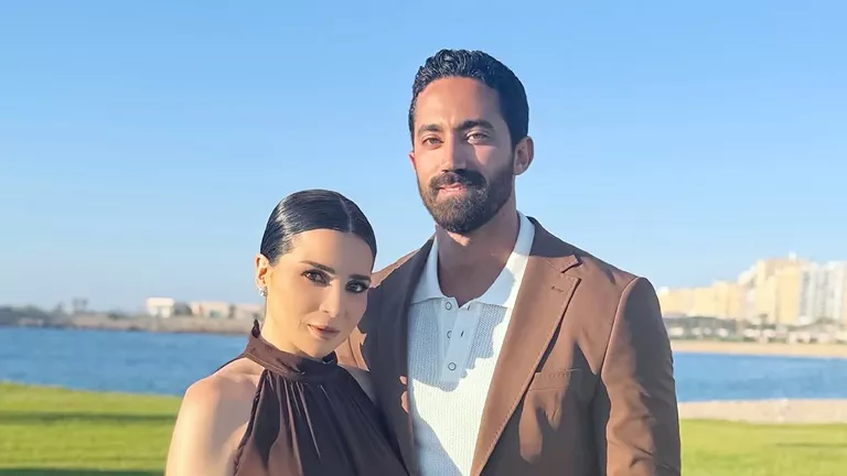 إطلالة مي عز الدين وزوجها
