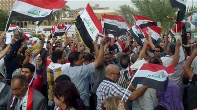 تظاهرة بالعراق تطالب بموقف دولي إزاء هجوم تركيا على عفرين السورية