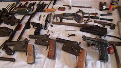 ضبط عاطلين بحوزتهما أسلحة نارية بالجيزة