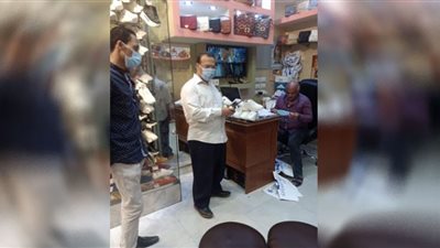 صور.. غرامة مالية لـ٩ مواطنين لعدم ارتداء الكمامة بالمنيا