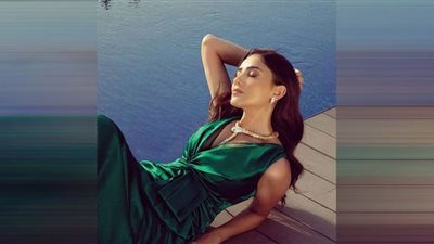 ببطن مكشوف| مي عمر تطل بالأبيض بدون مكياج والجمهور يغازلها (صور)