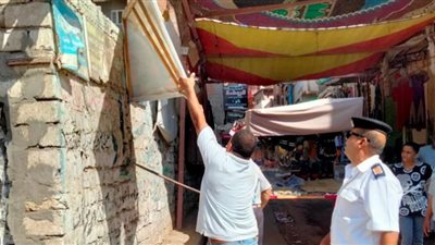 شرطة مرافق البحيرة تزيل التعديات على أسوار مدارس البحيرة