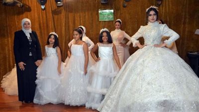 عبير شطا تكشف أحدث تصميمات فساتين زفاف المحجبات 2022
