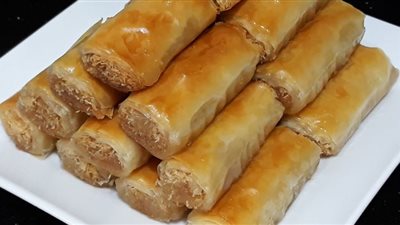 لمحبي الحلويات في رمضان.. طريقة عمل أصابع الجلاش بالكنافة