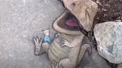 شاهد.. فنان أمريكي يحول تصدعات الطرق إلى لوحات فنية