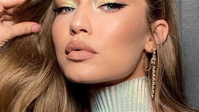 جيجي حديد تتألق بالأحمر الداكن وجاكيت المنفوخ في Met Gala 2022