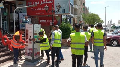 جهاز مدينة 6 أكتوبر يرفع الإشغالات بالمحور المركزي والكفراوي