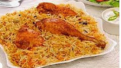 حضري برياني الدجاج على مائدة الغداء