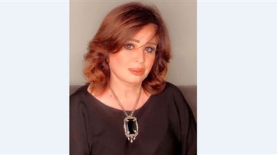 إلهام شاهين مع يحيى الفخراني في أعلى نقطة بنيويورك