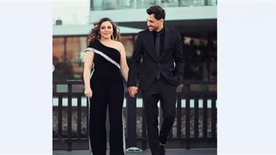 إلهام عبد البديع تتخلى عن أنوثتها وتقلّد زوجها في أحدث جلسة تصوير