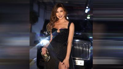 نانسي عجرم تسرق الأضواء بفستان شامبين في Joy Awards