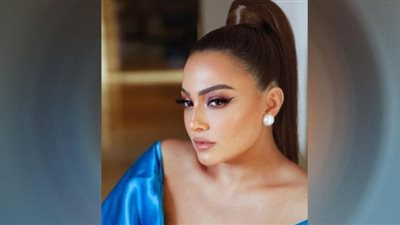 بشرى تهوس متابعيها بالعباءة الشفافة في الأقصر| صور