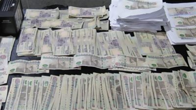 حبس ربة منزل لاتهامها بحيازة أموال مزورة