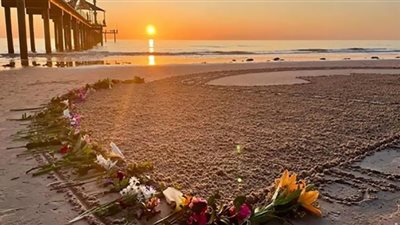 فنانة أسترالية تودع الملكة إليزابيث برسمة من الرمال