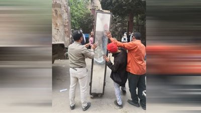 تحرير 89 محضر إشغالات للطريق العام بملوى
