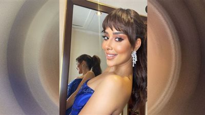 بلقيس فتحي زهرة في بستان بالأحمر والأخضر