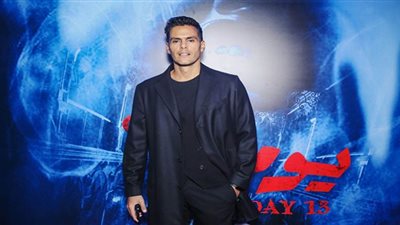 هشام خرما في العرض الخاص من فيلم يوم 13