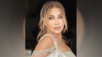 نوال الزغبي تستعيين بالكب لتعكس رشاقة قوامها