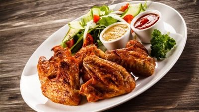 أجنحة الدجاج بالزنجبيل والبرتقال لمقبلات شهية