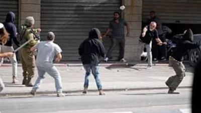 مستوطنون يعتدون على فلسطينين بقرية جالود