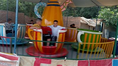 إقبال كبير على ألعاب حديقة حيوان الجيزة في أول أيام العيد (صور)