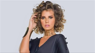 إيمان العاصي تشعل إنستجرام بمايوه مثير (صور)