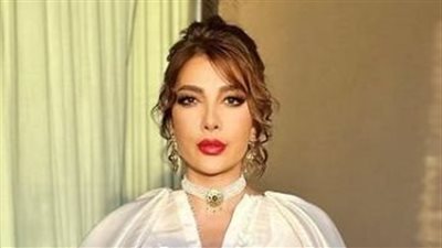 أصالة نصري بمكياج صاخب وفستان ساحر في حفلة تركيا