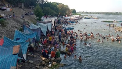 صور.. منطقة الشلالات بالقناطر الخيرية تحولت الى مصيف للغلابة