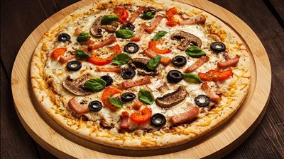 4 أطعمة تسبب الإدمان.. البيتزا والشوكولاتة في الصدارة 