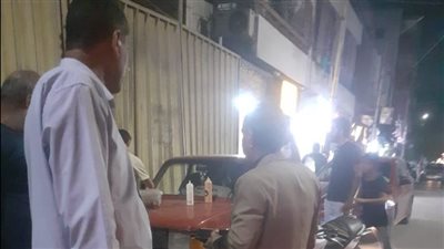 حملة إشغالات كبرى تتحفظ على عربة لبيع المأكولات في شارع المحافظة بأسيوط