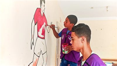 تنفيذ مشروع تطوعي مجتمعي لدهانات مركز شباب الوقدة بالمراغة 