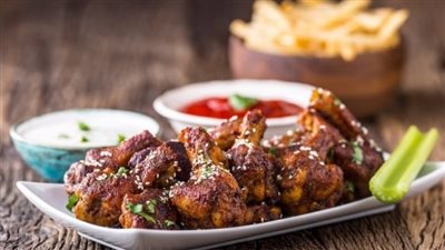 طريقة تحضير أجنحة الدجاج بالبصل