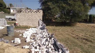 إزالة 3 حالات تعدٍّ على أرض زراعية بقرية فاو بحري بقنا 